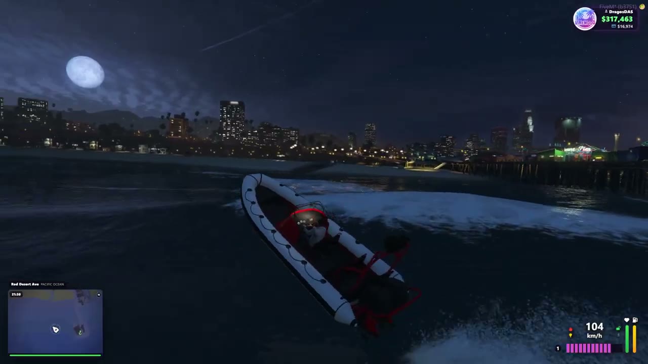 Vinewood: a speedboat at night by the pier, the moon and the city lights behind