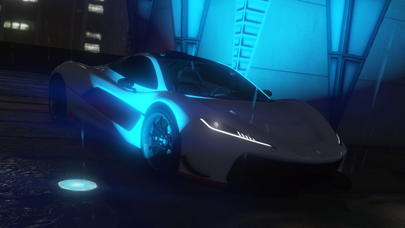 Vinewood: a supercar lit in neon blue at night in Los Santos