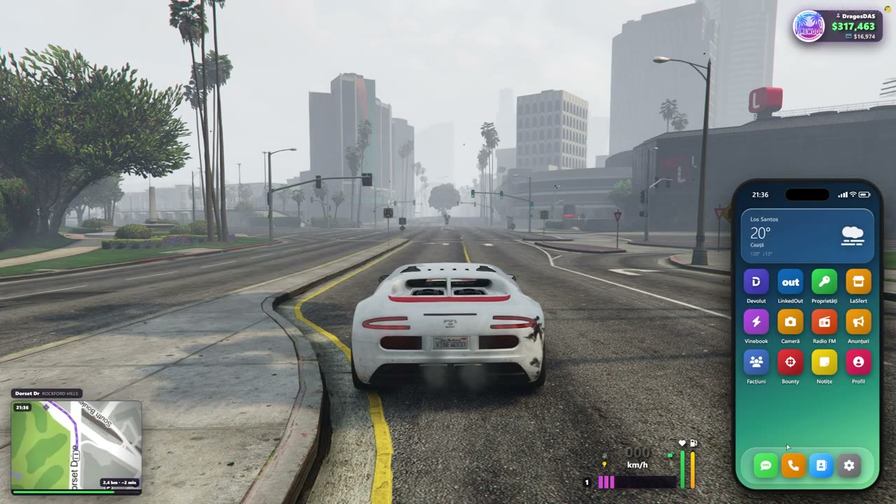 Vinewood: the in-game phone's home screen, open while driving through Los Santos